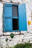 Blue-shuttered window, Kayakoy, Turkey