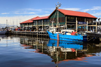 Blue boat at Mures, Hobart harbor, Tasmania, Australia